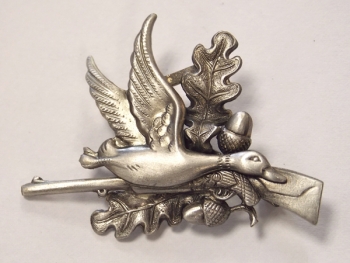 Broche canard au fusil