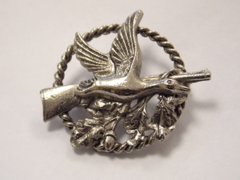 Broche canard au fusil